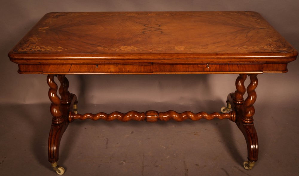 A Victorian Burr Walnut Library Table Inlaid