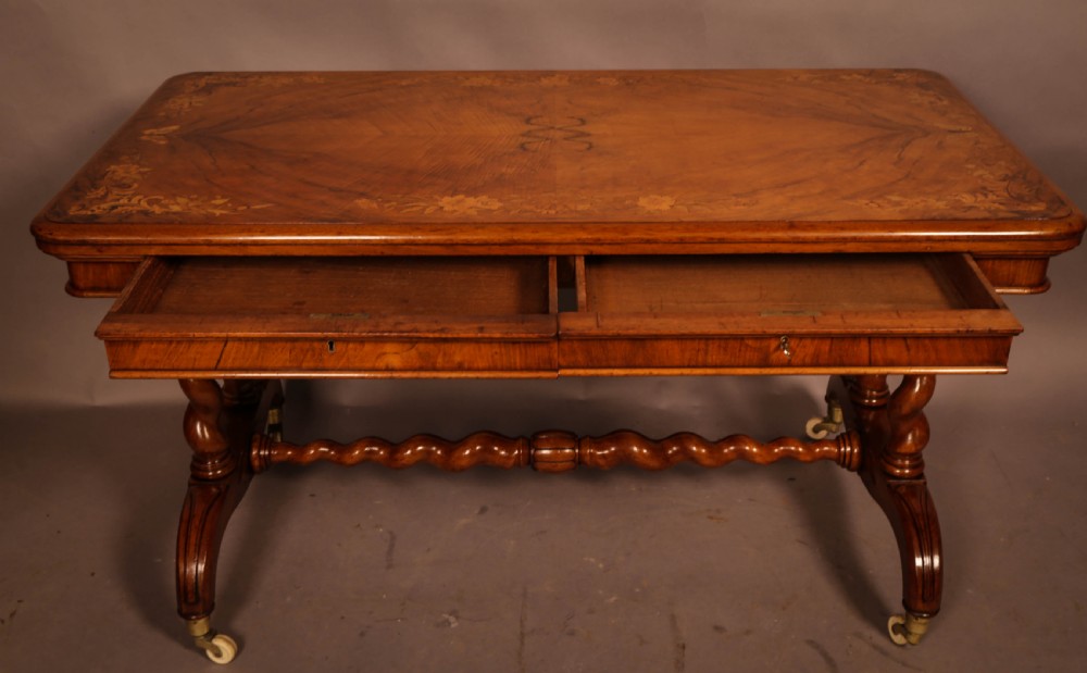 A Victorian Burr Walnut Library Table Inlaid View II