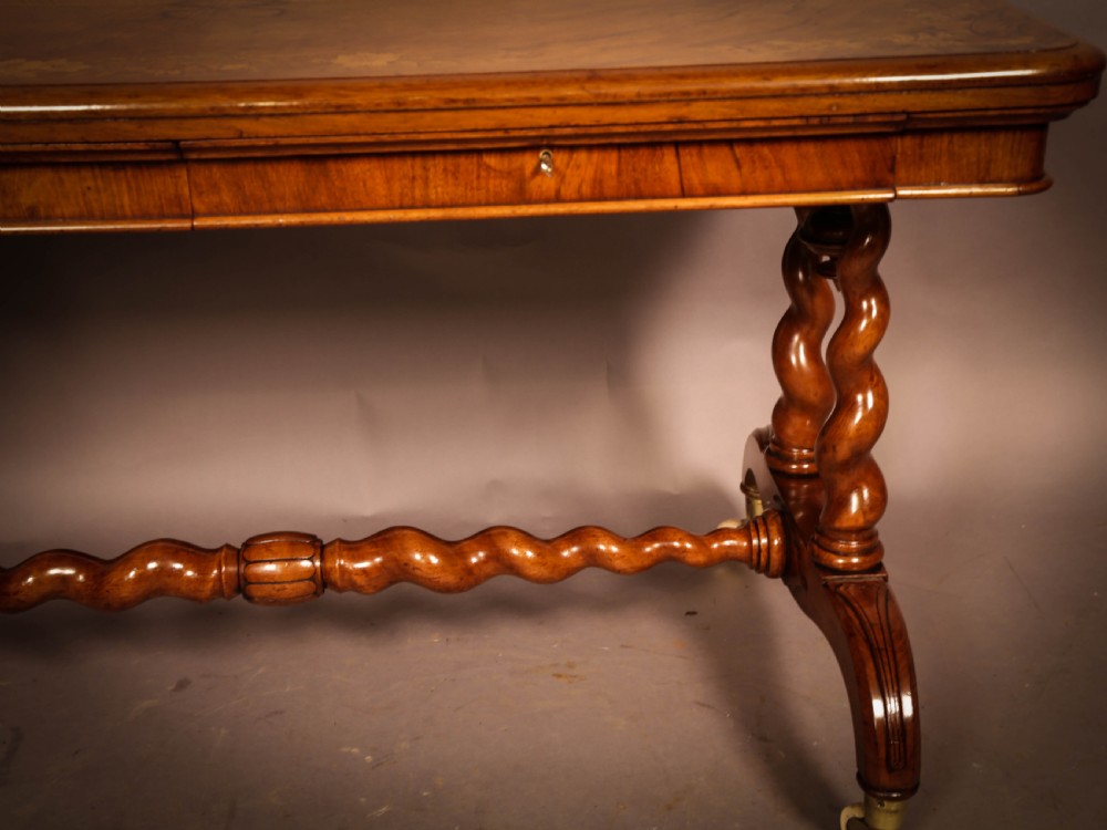 A Victorian Burr Walnut Library Table Inlaid View VIII