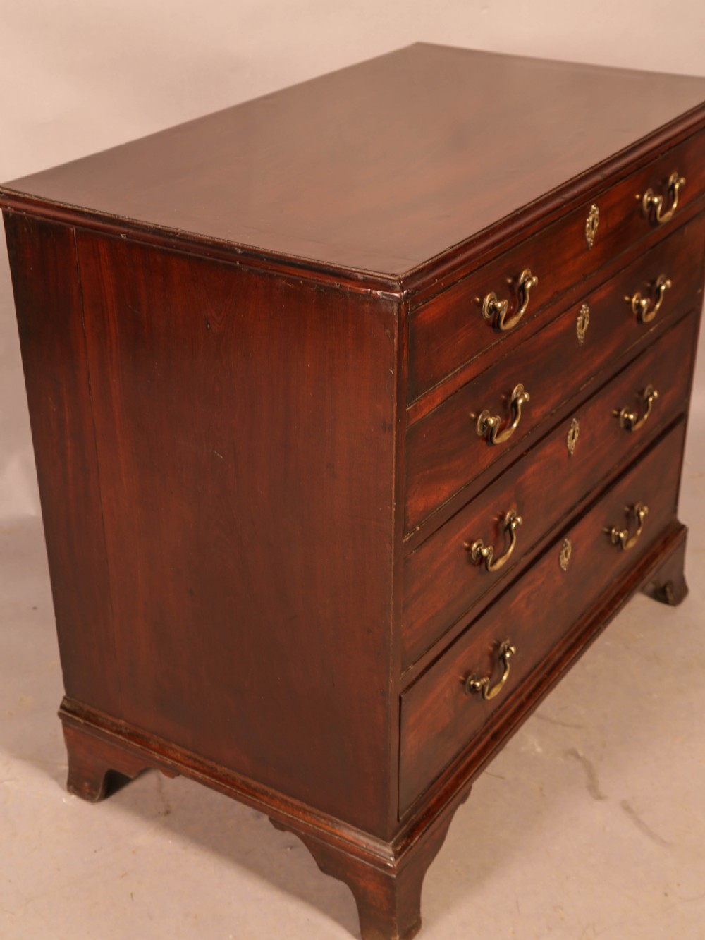 A Georgian Mahogany Chest of Drawers original brasswork c 1780 View V