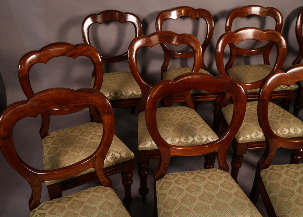 A Good Set of 12 Victorian Balloon Back Dining chairs View II
