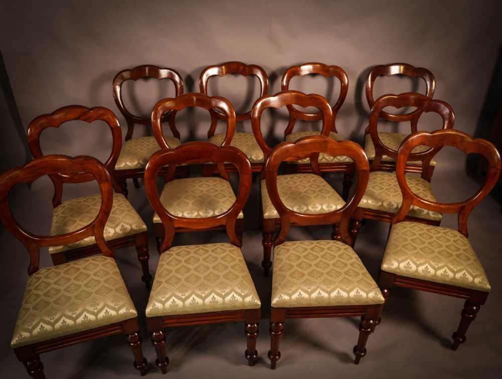 A Good Set of 12 Victorian Balloon Back Dining chairs View IV