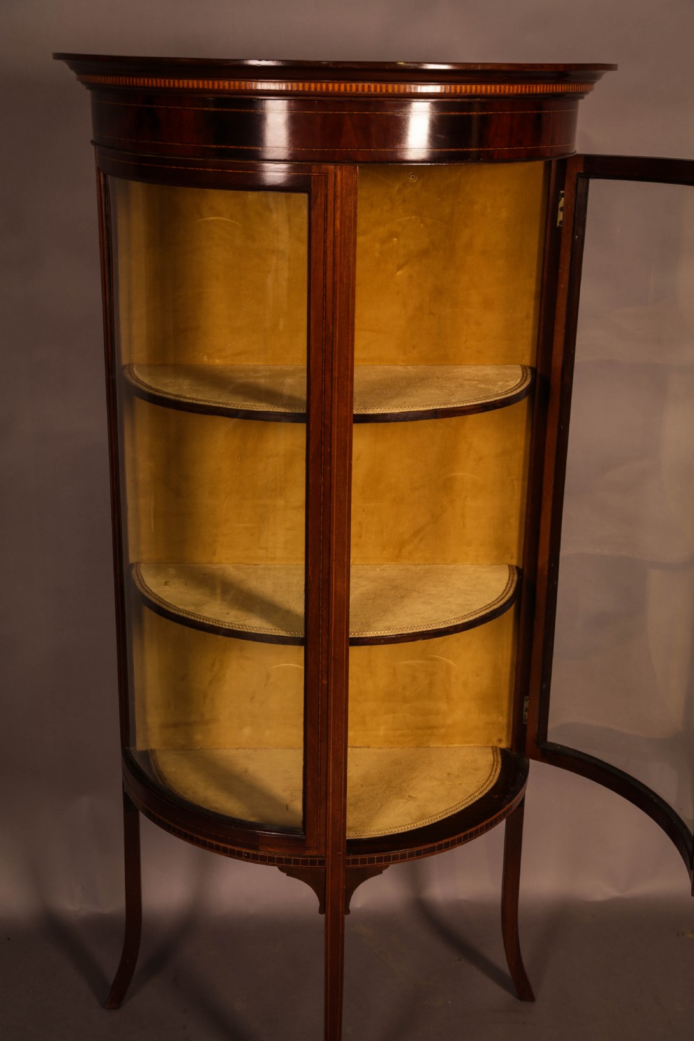 A Good Quality Display Cabinet with Bow Glass Doors