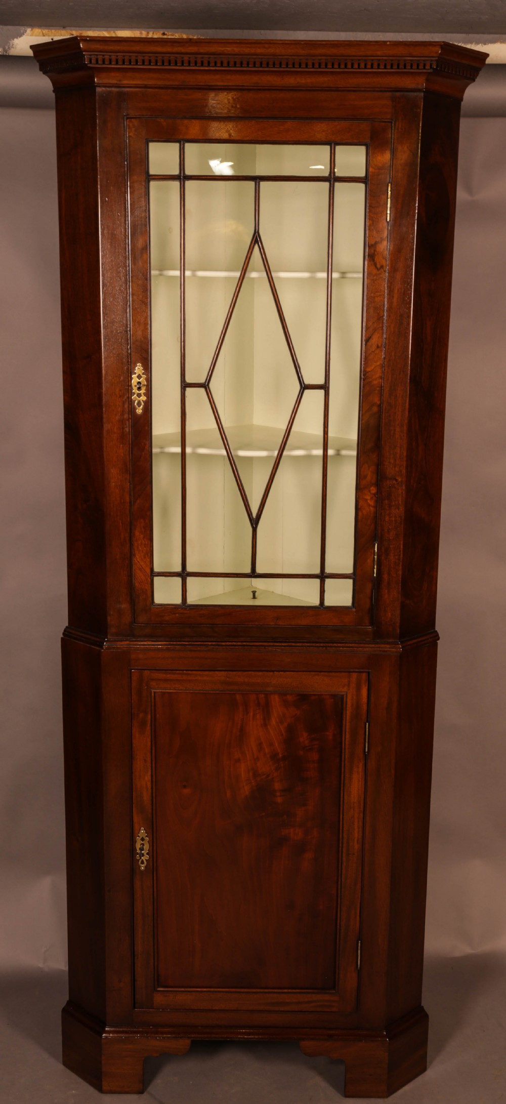 A Georgian Floor Standing Corner Cupboard