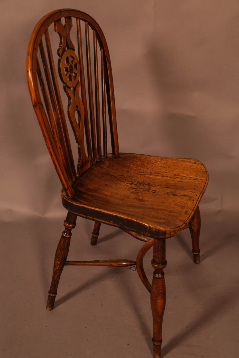 A Single Wheel Back Kitchen Windsor Chair in Yew Wood View II