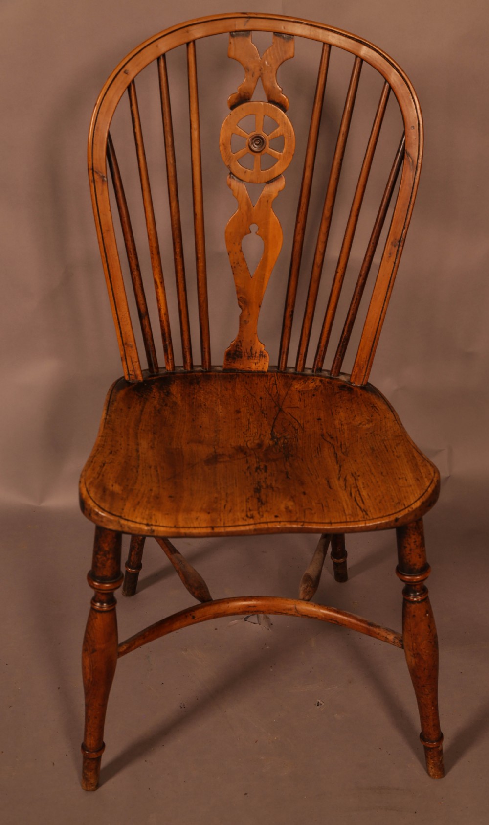 A Single Wheel Back Kitchen Windsor Chair in Yew Wood View VII