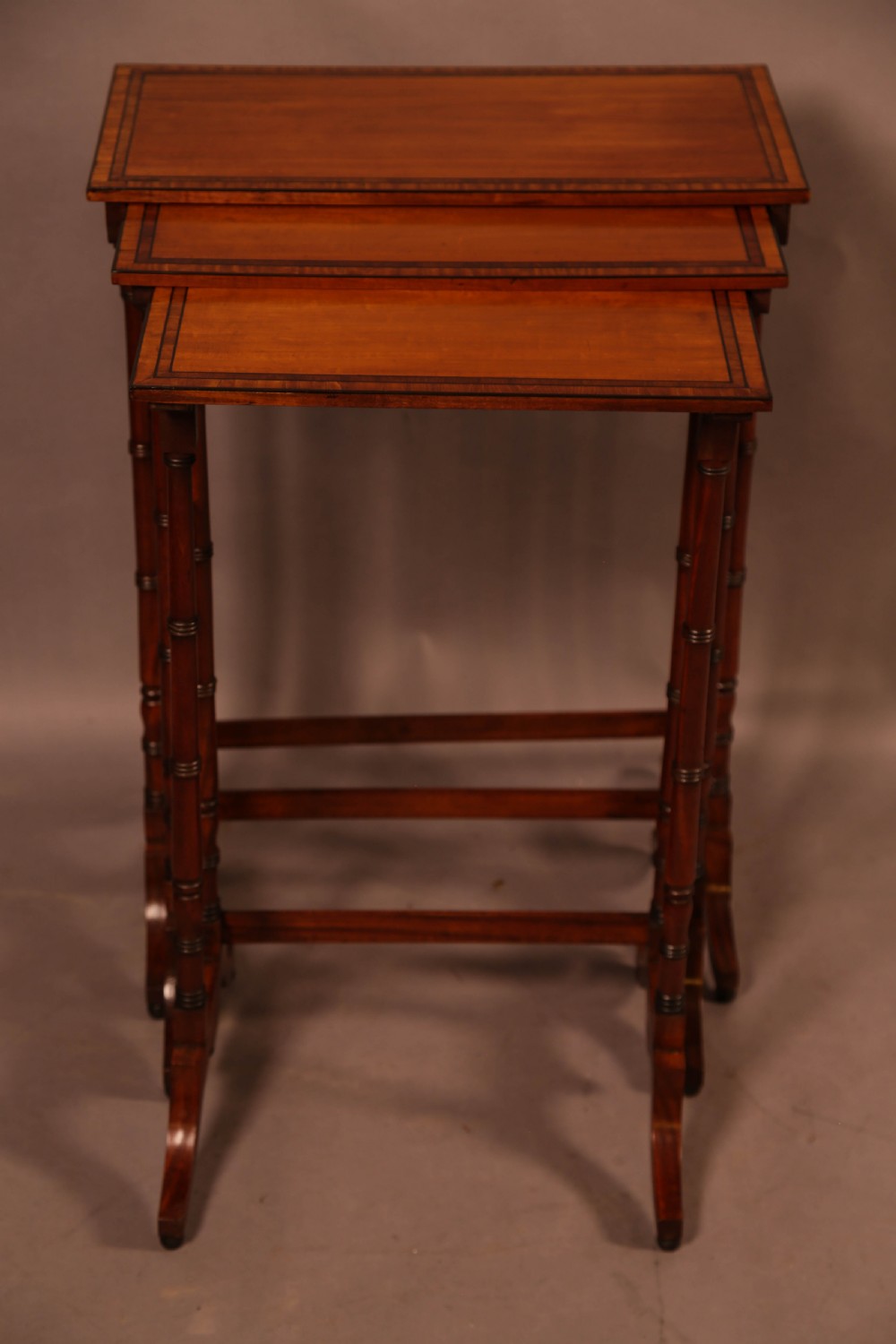 A Regency Nest of Three Tables in Satinwood View III
