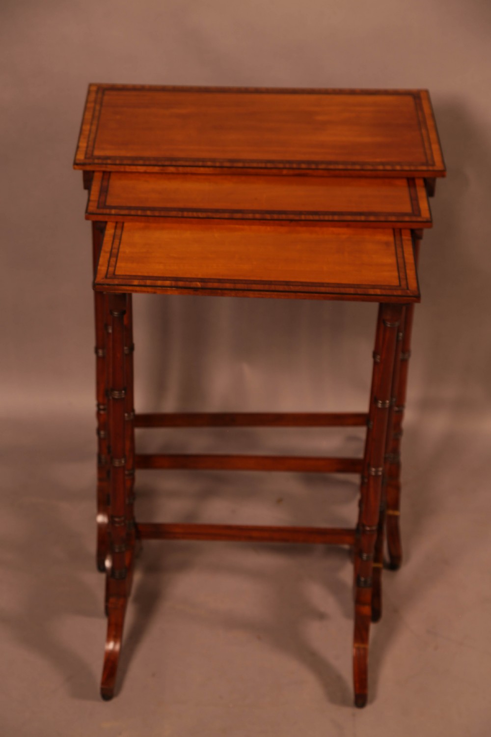A Regency Nest of Three Tables in Satinwood View IV
