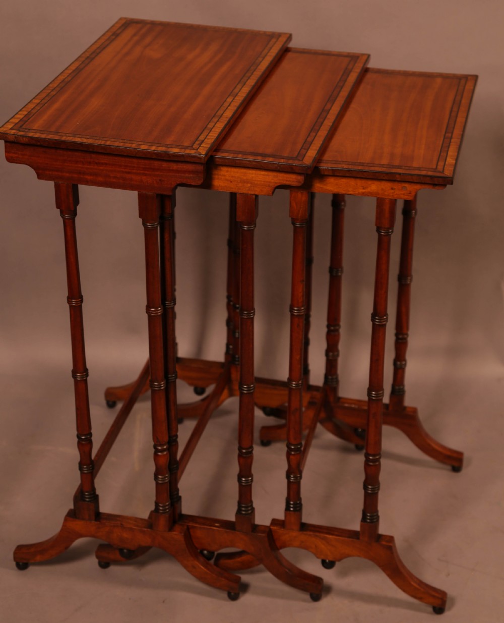 A Regency Nest of Three Tables in Satinwood View V