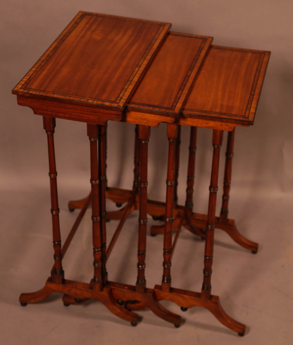 A Regency Nest of Three Tables in Satinwood View VI
