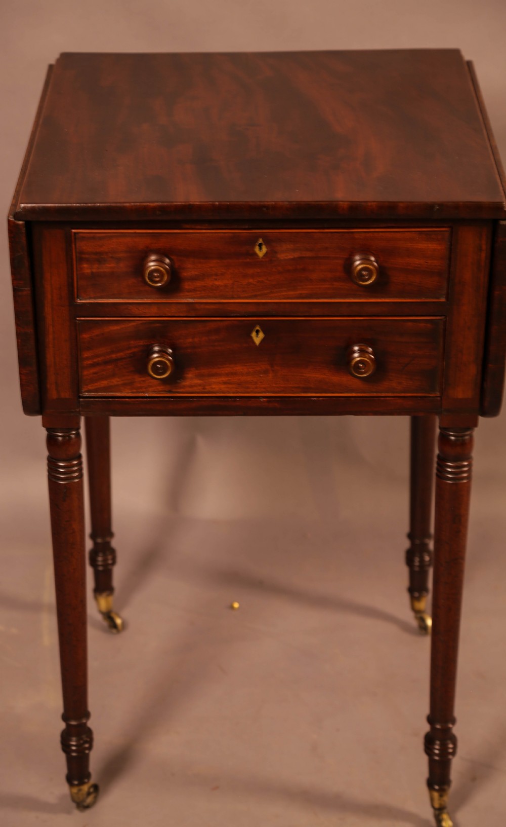 A 19th century Pembroke Sewing Table View IV