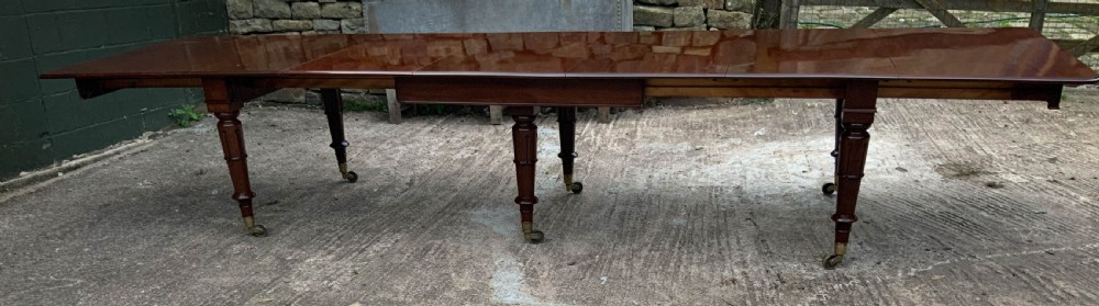 A Very Good late Georgian Extending Dining Table seats 14/16 View III