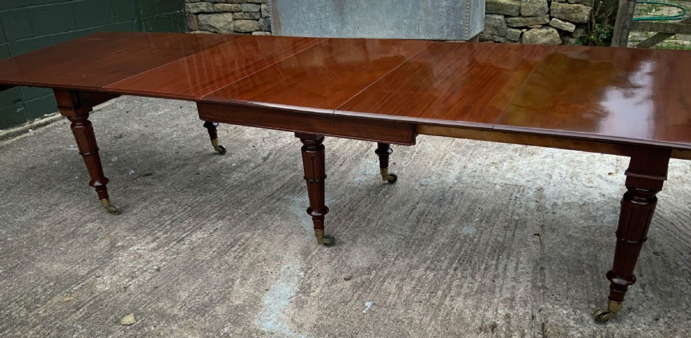 A Very Good late Georgian Extending Dining Table seats 14/16 View IV