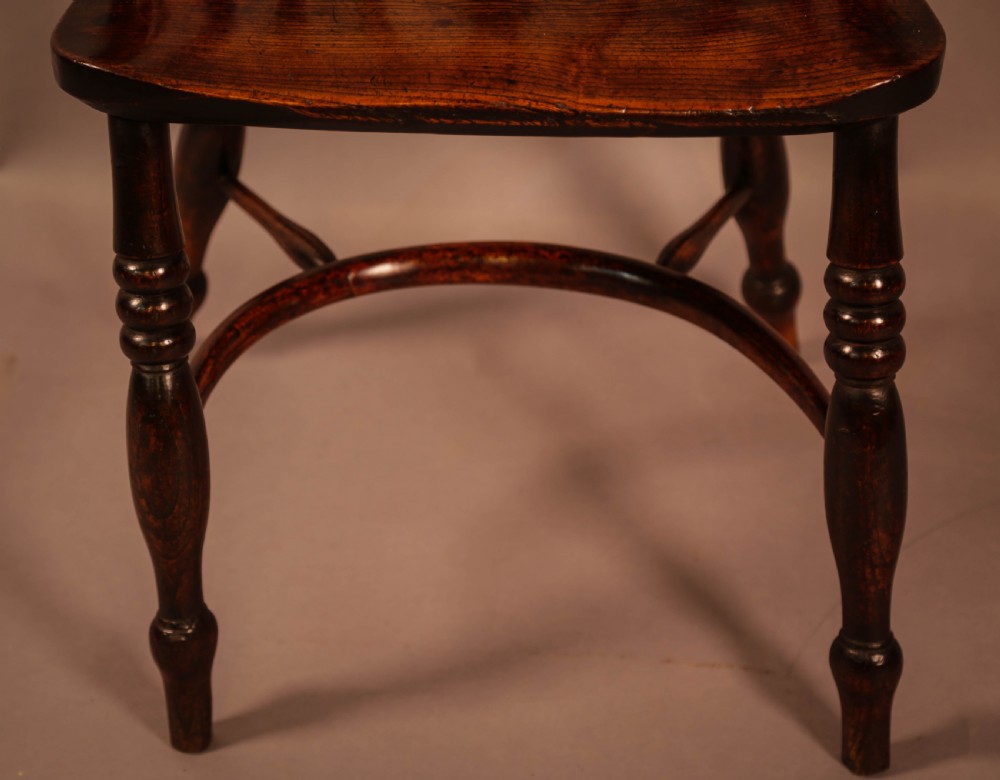 An Ash and Elm Windsor Chair stamped F Walker Rockley View VI