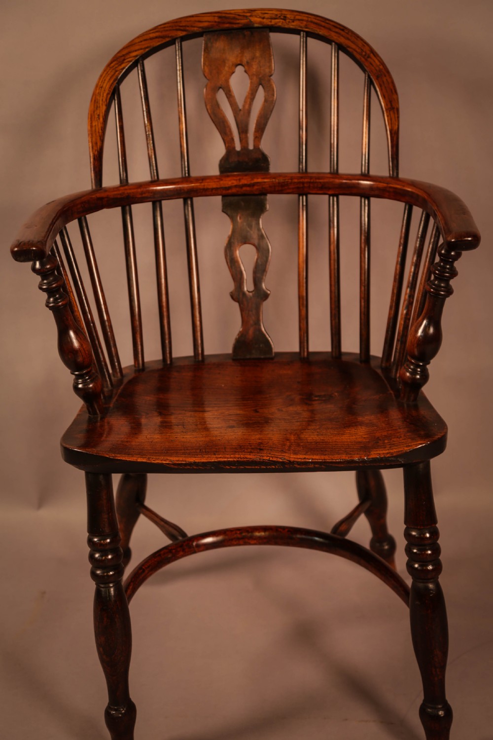 An Ash and Elm Windsor Chair stamped F Walker Rockley View VII