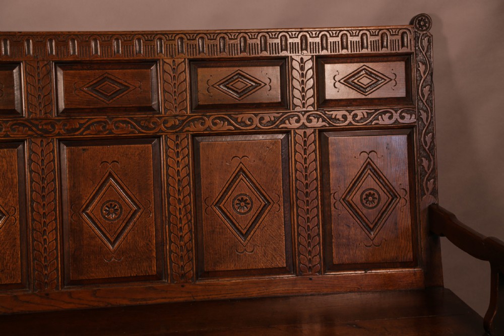 A Georgian Oak Settle with storage drawers View IV