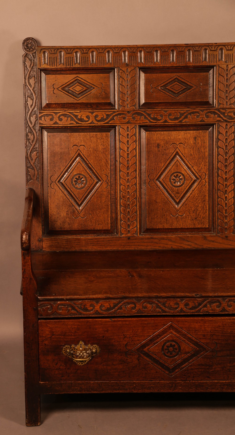 A Georgian Oak Settle with storage drawers View V