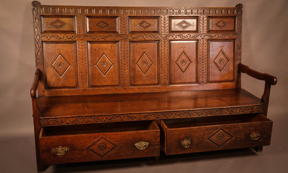 A Georgian Oak Settle with storage drawers View VII