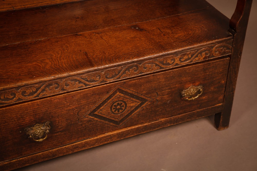 A Georgian Oak Settle with storage drawers View VIII