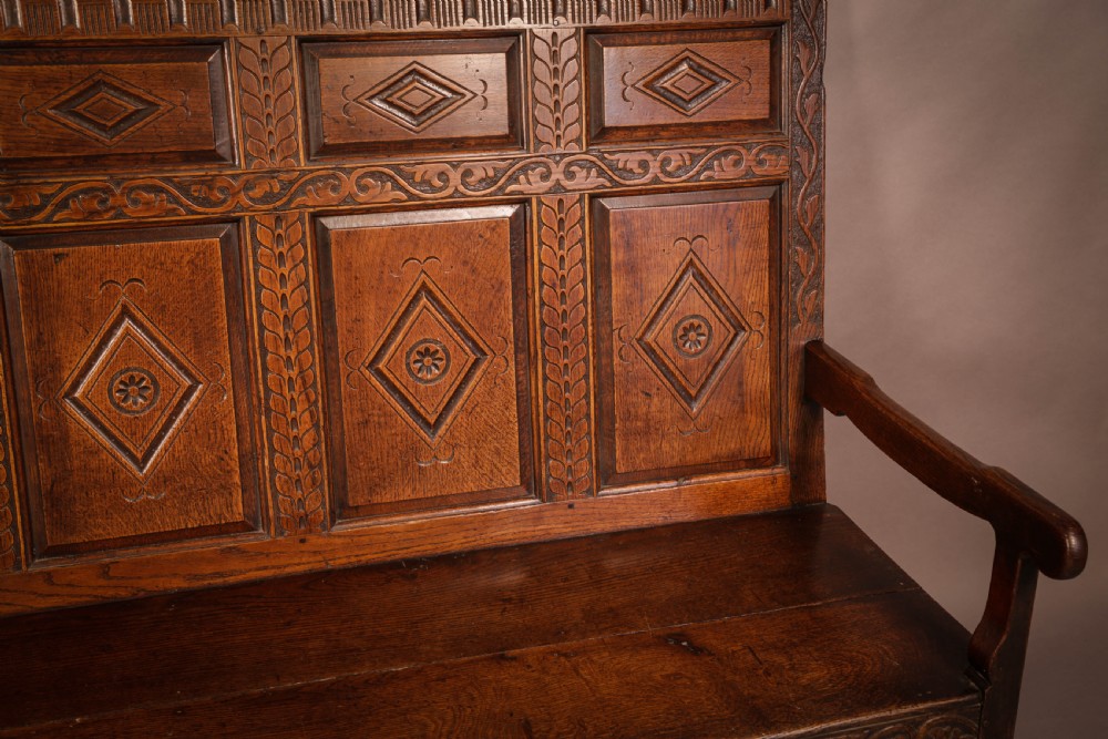 A Georgian Oak Settle with storage drawers View IX