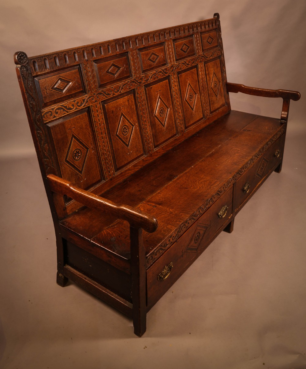 A Georgian Oak Settle with storage drawers View X