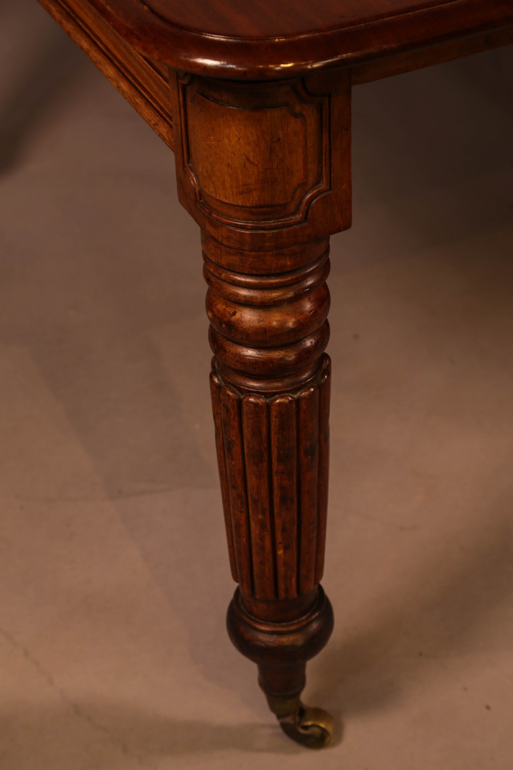 An Early 19th century Mahogany extending dining table View V
