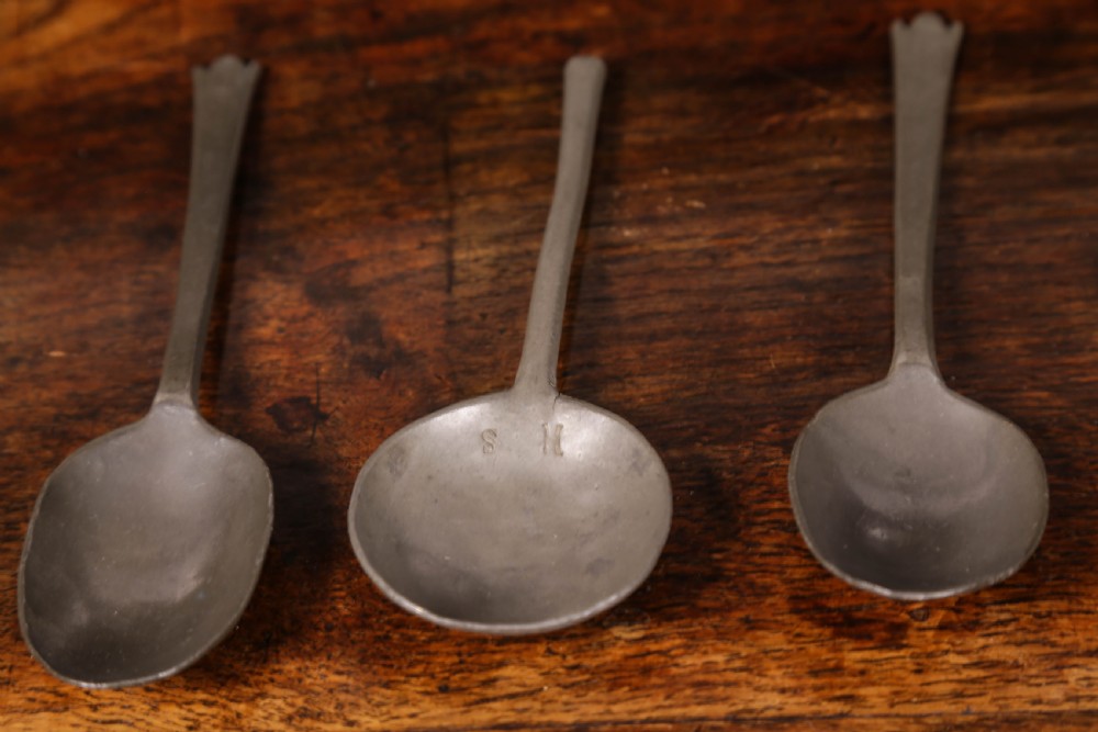 Three pewter Spoons