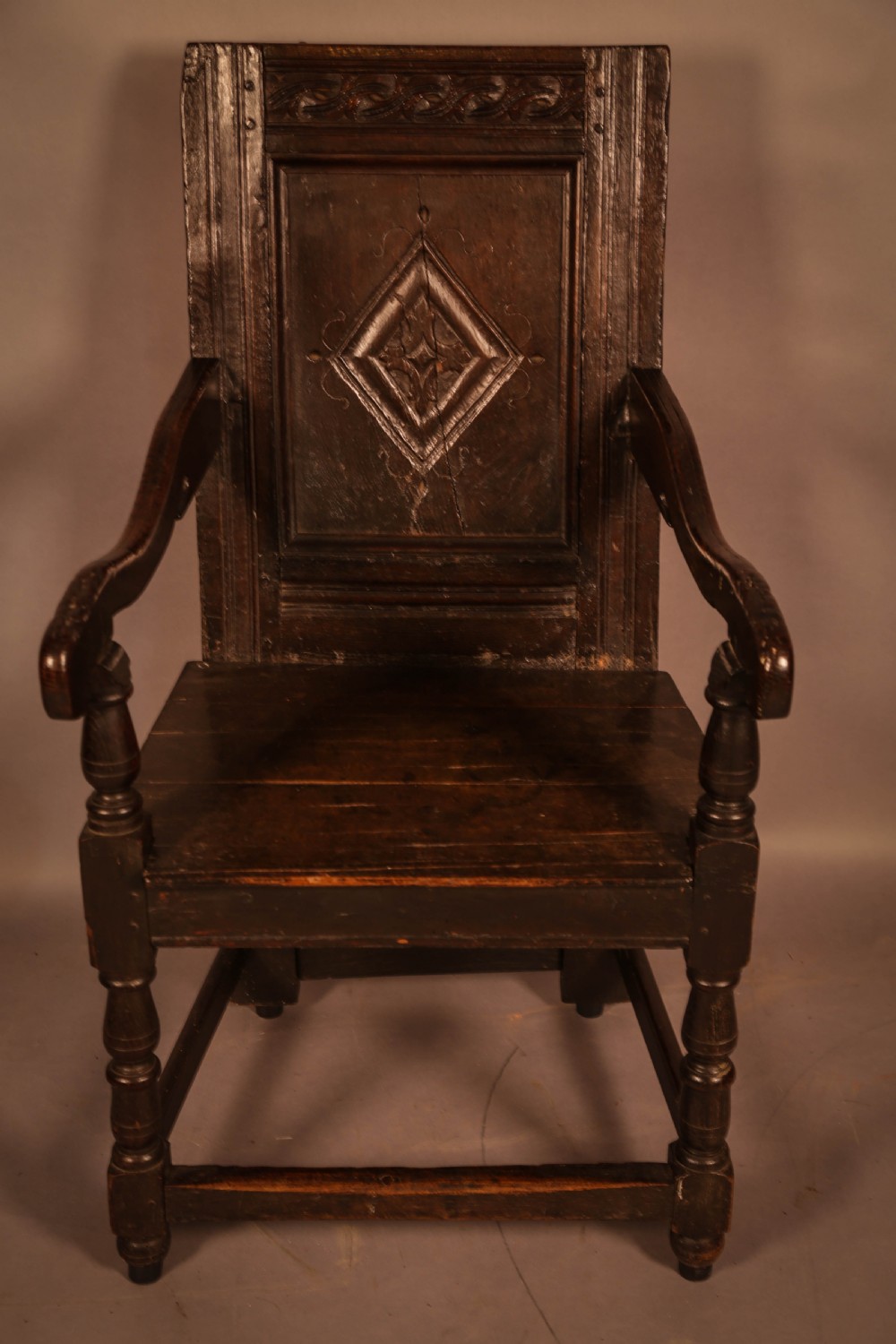 A 17th century Oak Wainscott Armchair