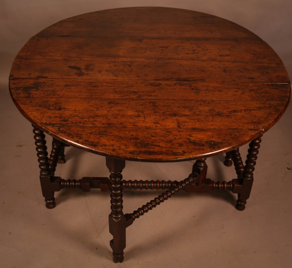 A Rare Yew Wood Gate Leg Table