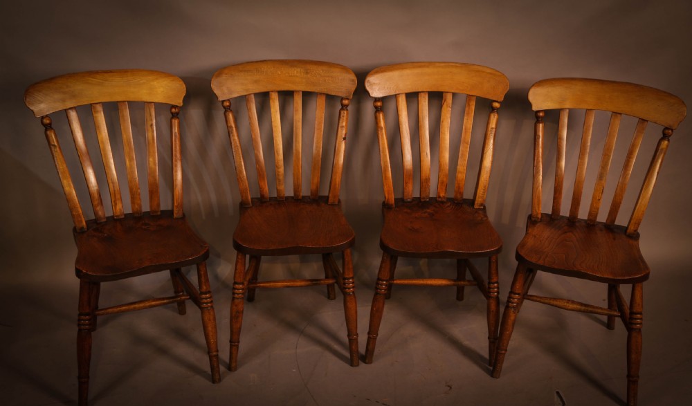 A set of 4 lath back Kitchen chairs 19th century View II