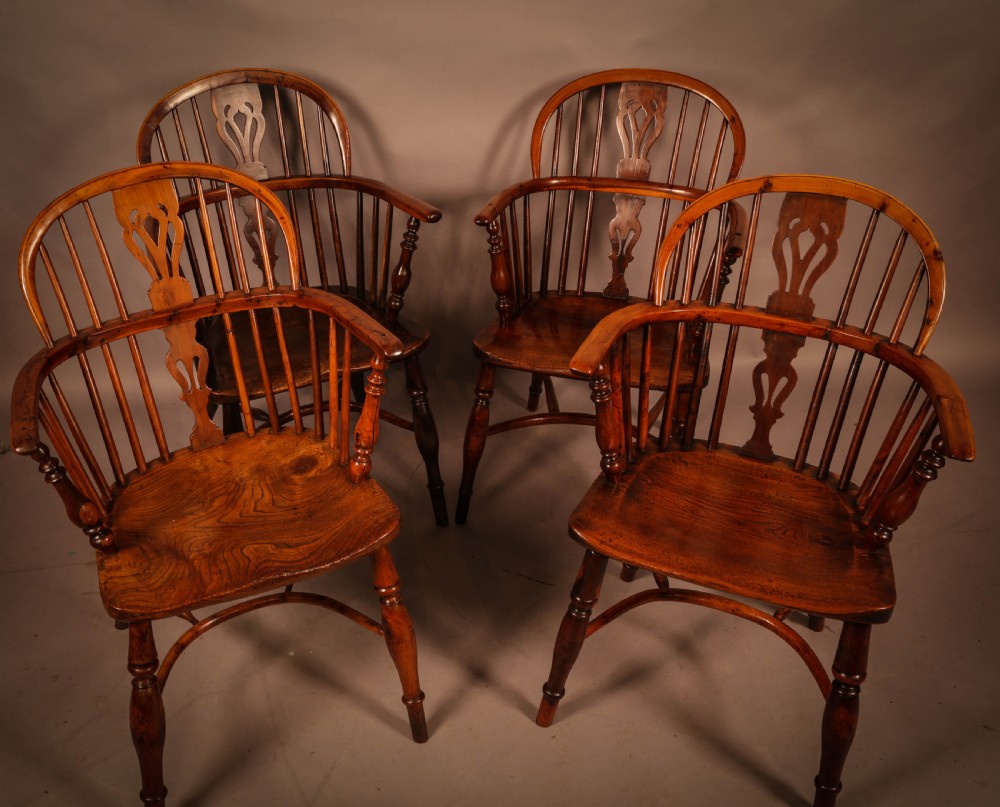 A Good set of 4 Yew Wood Windsor Chairs by George Nicholson