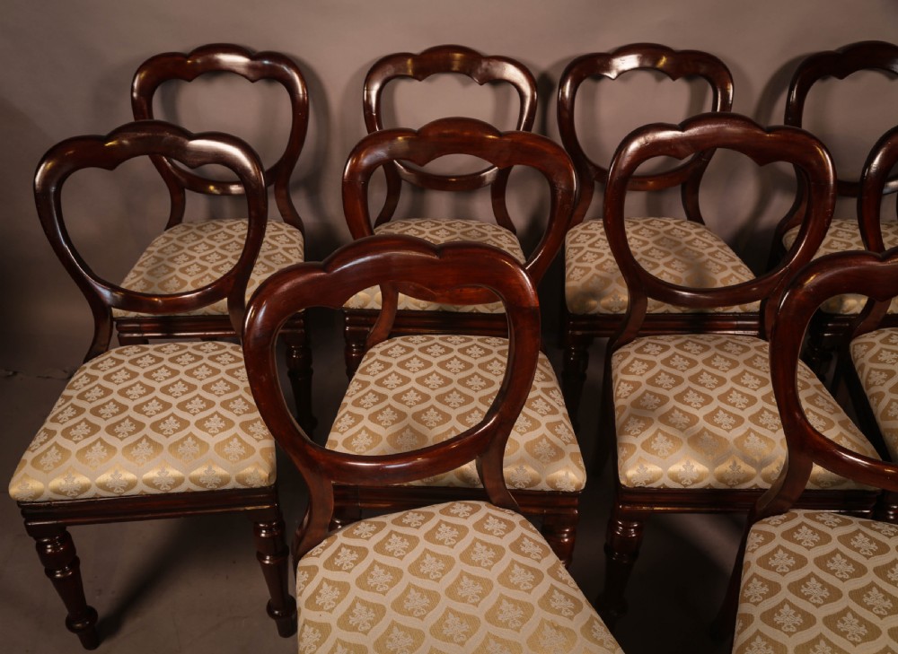 A Good set of 10 Victorian Mahogany Balloon Back Dining Chairs View II