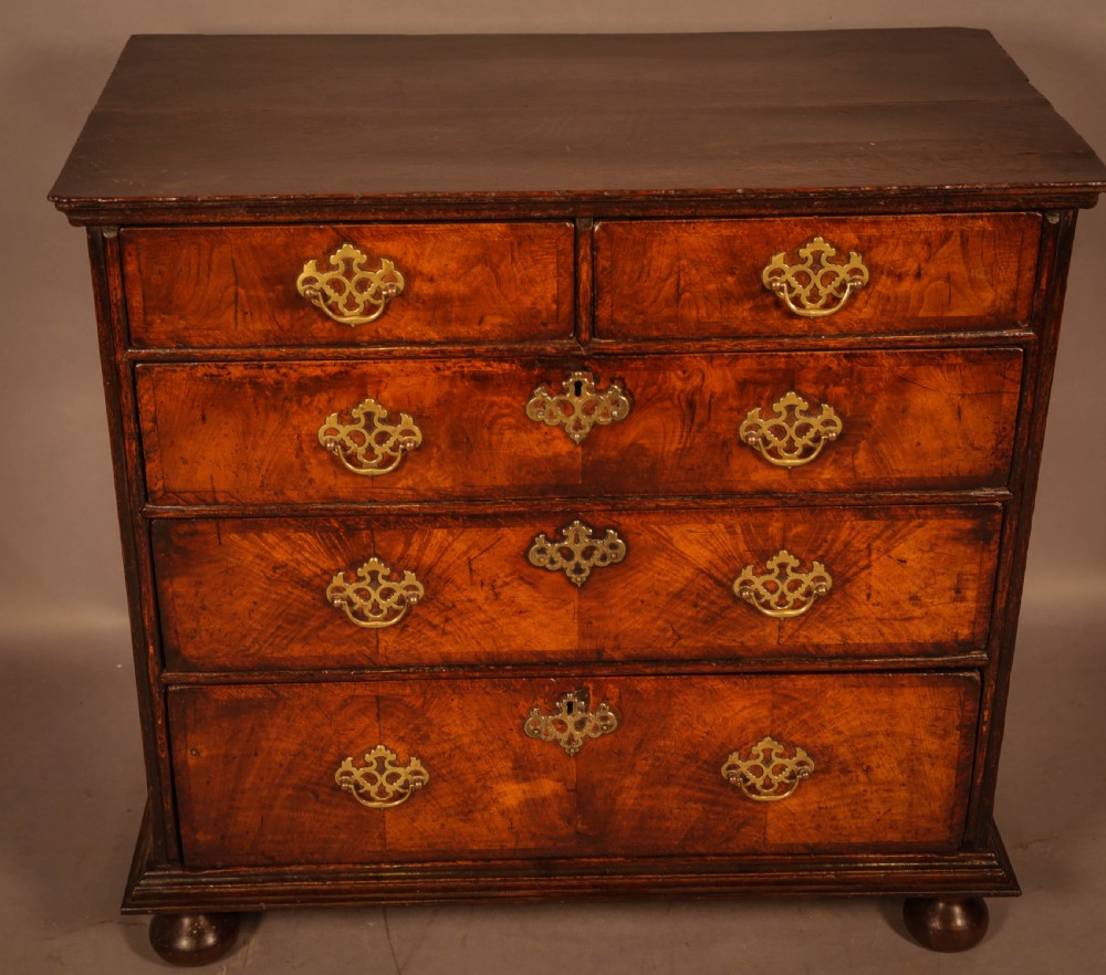 A Georgian Chest of Drawers in Walnut c 1730