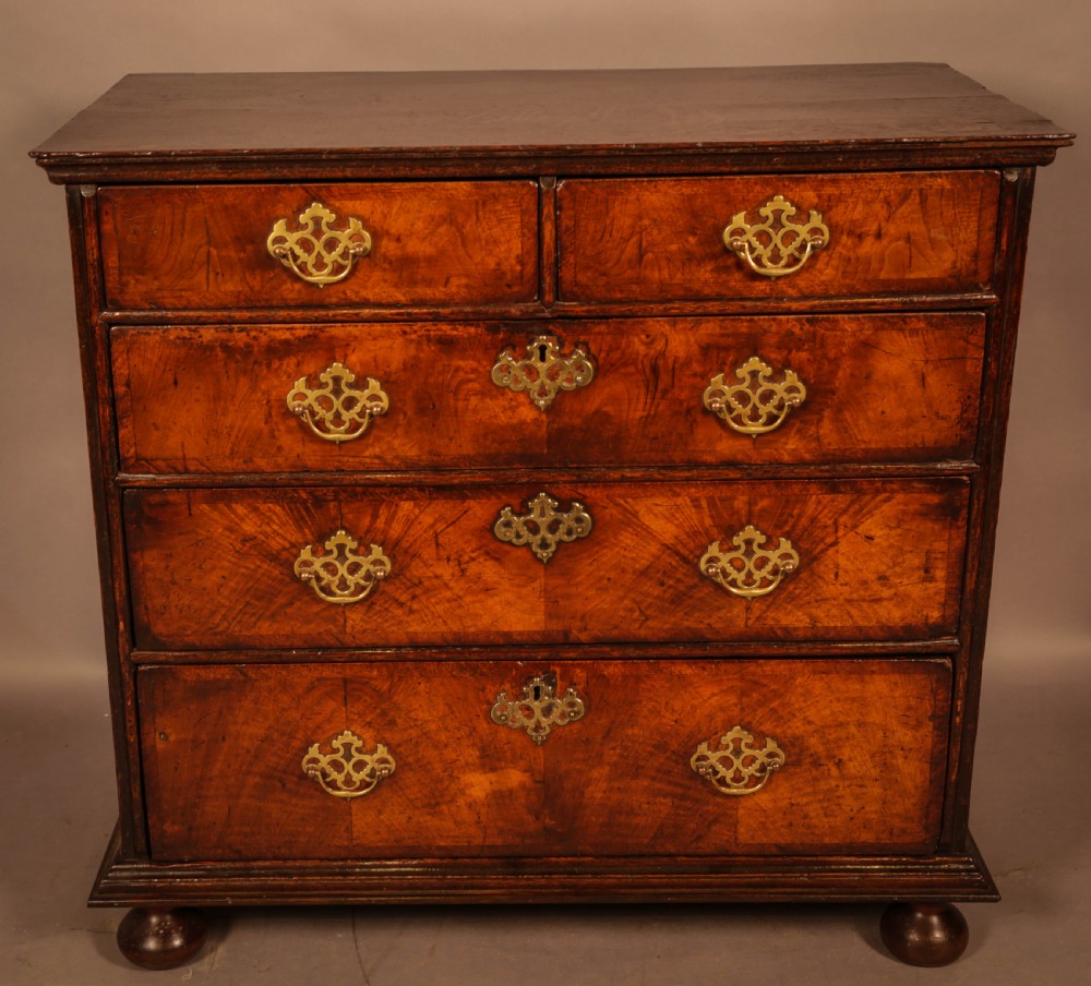 A Georgian Chest of Drawers in Walnut c 1730 View II