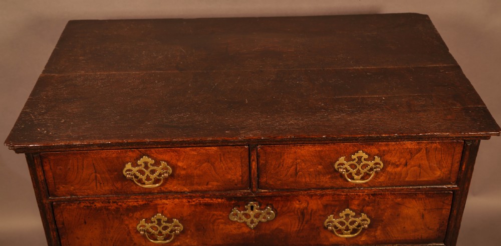 A Georgian Chest of Drawers in Walnut c 1730 View III