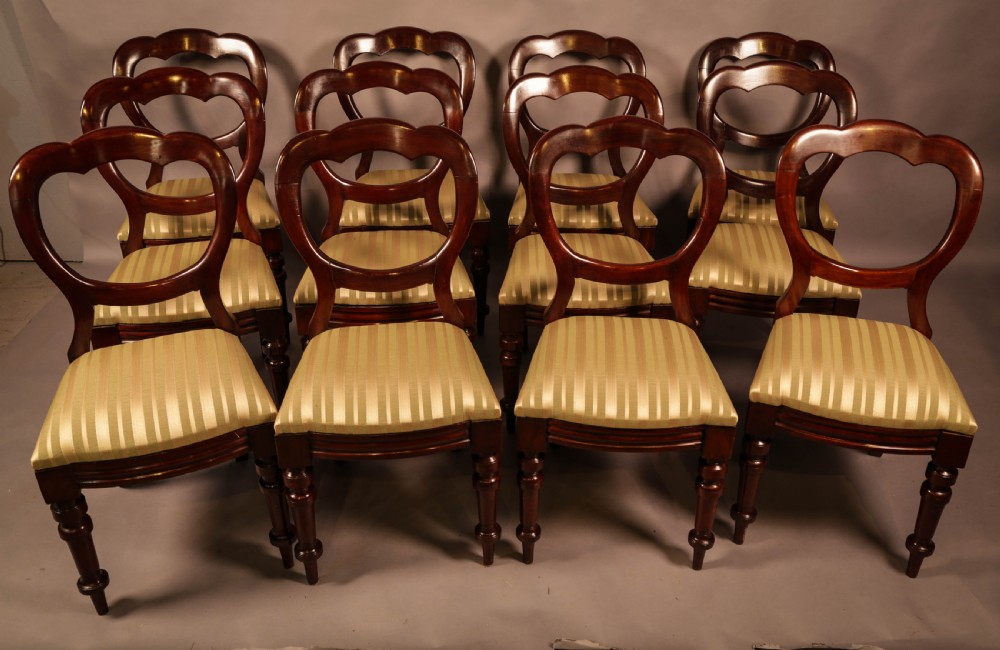 A Set of 12 Victorian Balloon Back Dining Chairs c 1860
