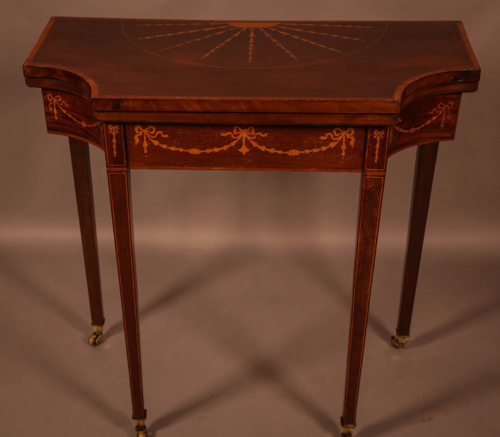 A Fine Georgian Card table in Mahogany with Inlay
