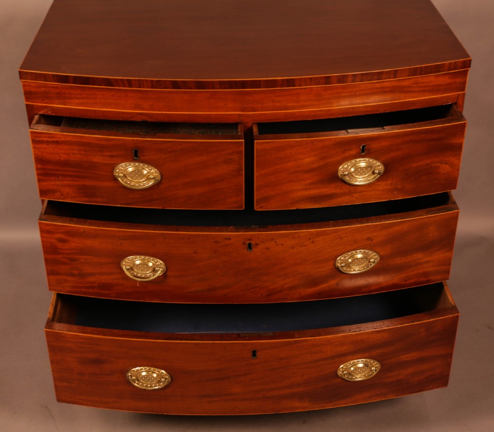 An early 19th century Bow Chest of Drawers Mahogany View II
