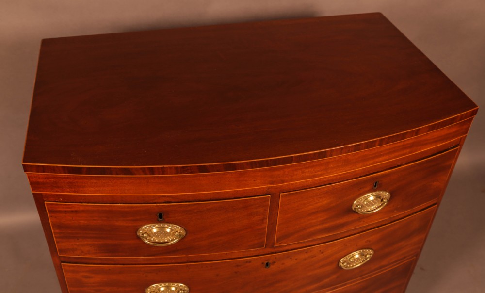 An early 19th century Bow Chest of Drawers Mahogany View IV