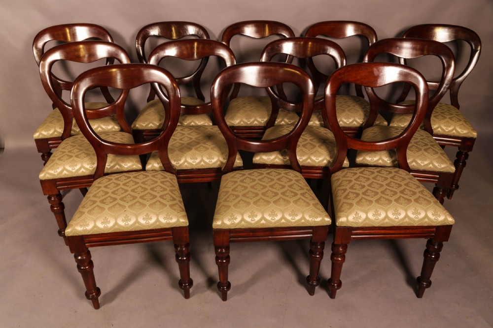 A Set of 12 Victorian Mahogany Balloon Back Dining Chairs View II