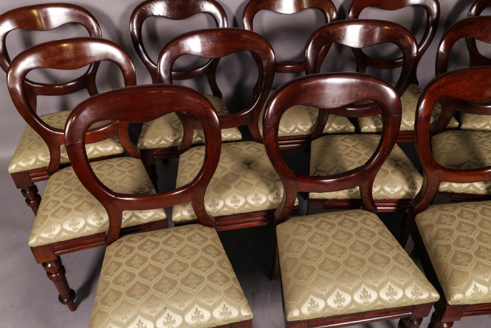 A Set of 12 Victorian Mahogany Balloon Back Dining Chairs View III