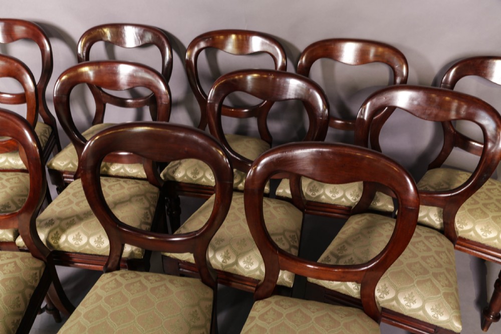 A Set of 12 Victorian Mahogany Balloon Back Dining Chairs View IV