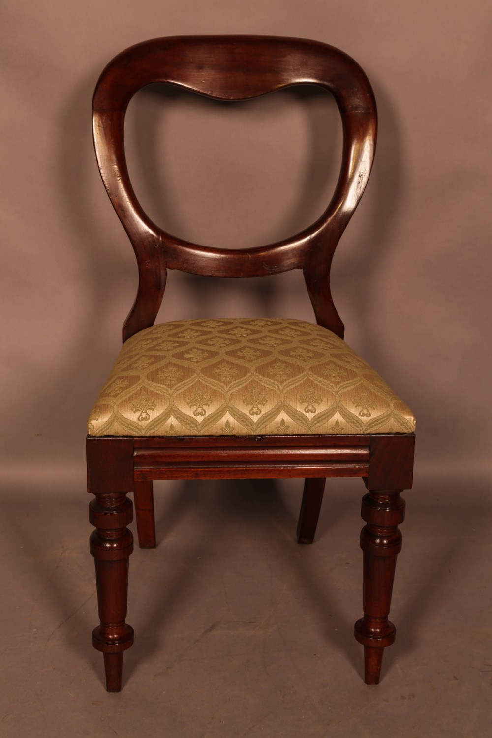 A Set of 12 Victorian Mahogany Balloon Back Dining Chairs View VI