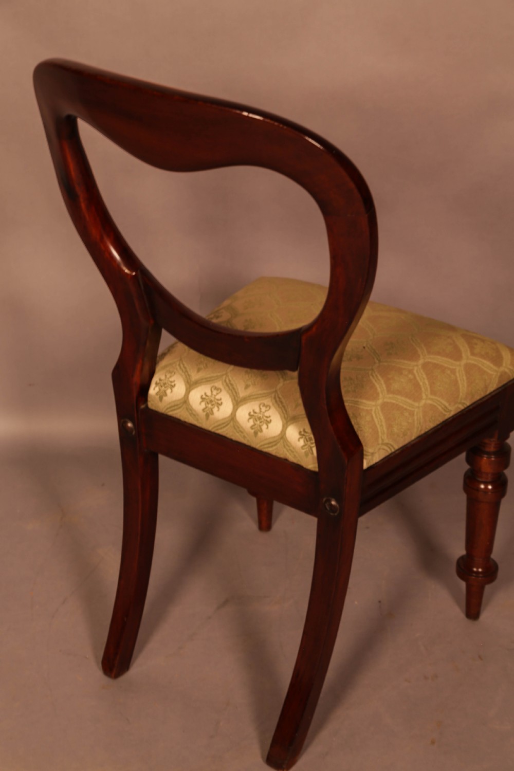 A Set of 12 Victorian Mahogany Balloon Back Dining Chairs View VIII