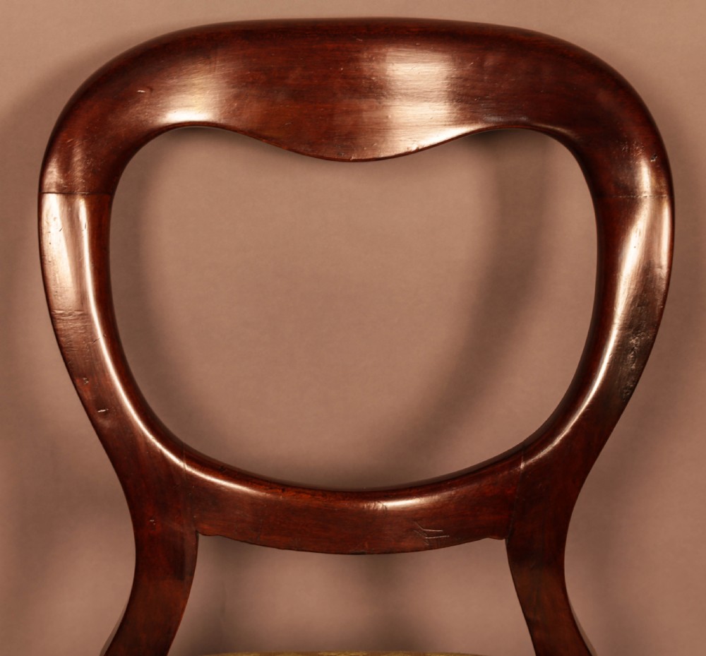 A Set of 12 Victorian Mahogany Balloon Back Dining Chairs View IX