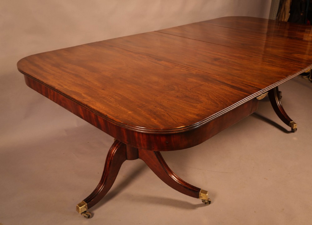 A Georgian Twin Pillar Dining Table in mahogany View II