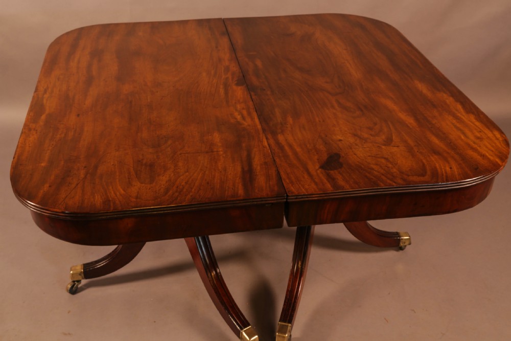 A Georgian Twin Pillar Dining Table in mahogany View VI