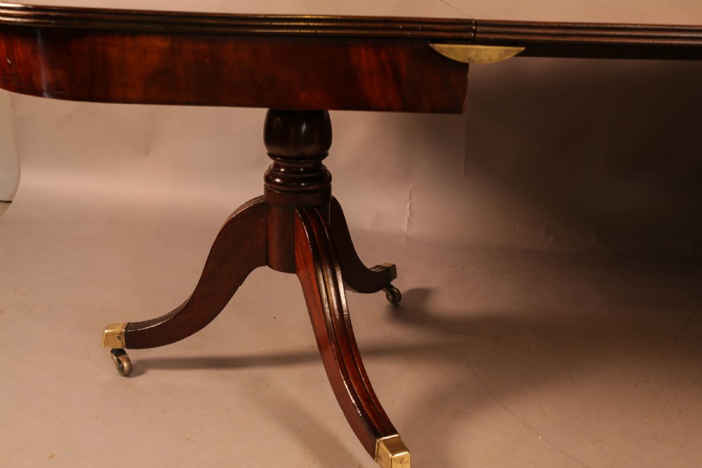 A Georgian Twin Pillar Dining Table in mahogany View XIV