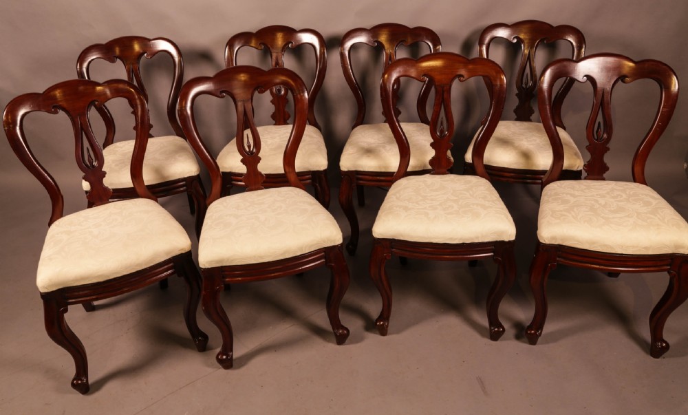 A Set of 8 Victorian Spear Point Balloon Back Dining Chairs