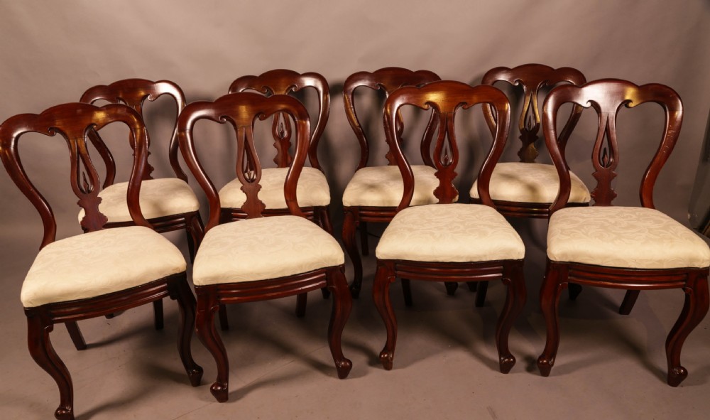 A Set of 8 Victorian Spear Point Balloon Back Dining Chairs View II
